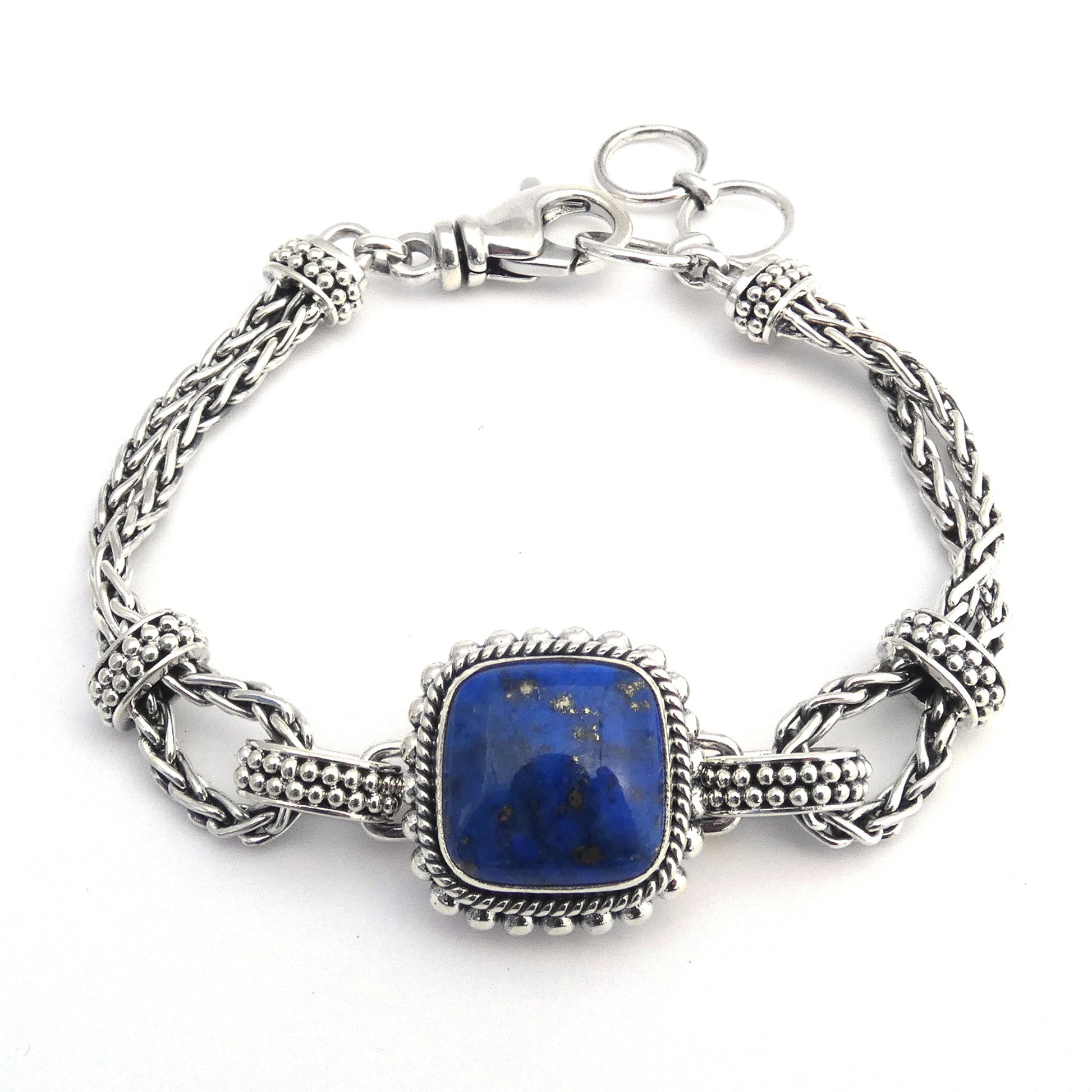 Sterling silver bracelet with a lapis lazuli gemstone.