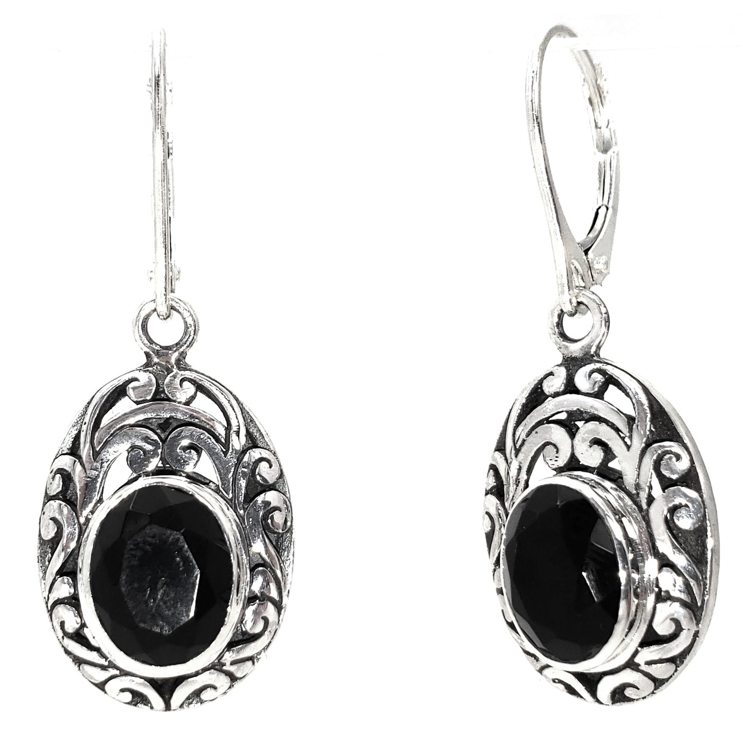 Sterling silver and faceted onyx earrings.