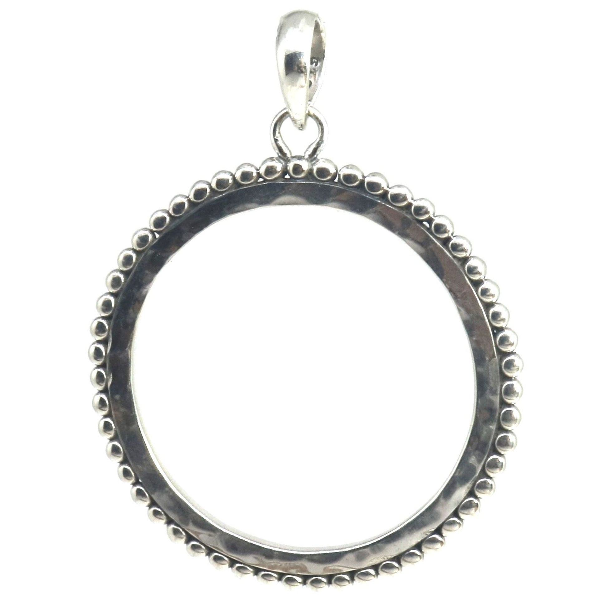 Sterling silver circle pendant.