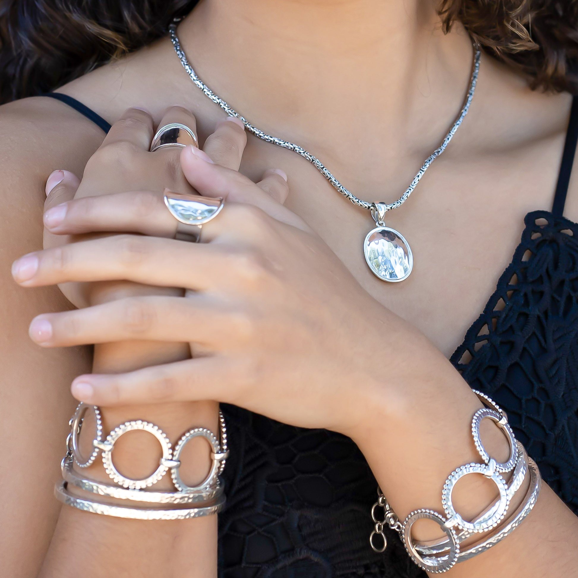 Sterling silver oval pendant.